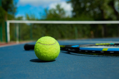 Close-up of green ball on table