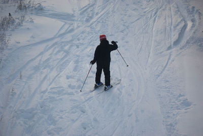 Full length of man skiing on snowy mountain