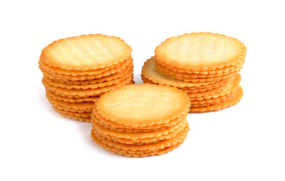 Close-up of cookies against white background