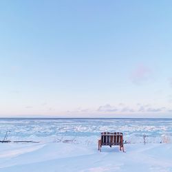 Scenic view of sea against sky during winter