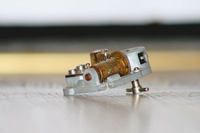 Close-up of guitar on table