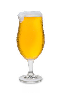 Close-up of beer glass against white background