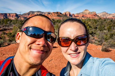 Portrait of smiling man wearing sunglasses