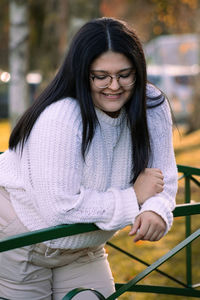 Portrait of a smiling young woman in winter