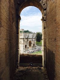 Historic building seen through arch