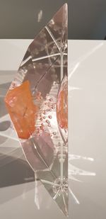 Close-up of ice cream on glass table