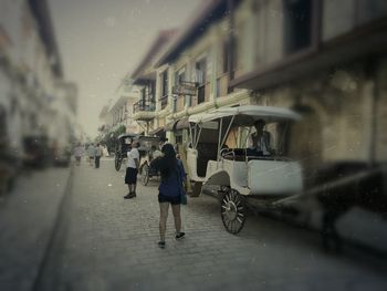 People on street in city