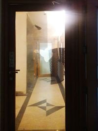 Reflection of building on glass door