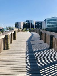 Pier over river against sky