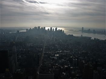 High angle view of buildings in city against sky