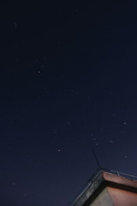 Low angle view of stars against sky at night