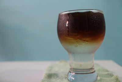 Close-up of beer glass on table