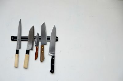 High angle view of objects on table against white background