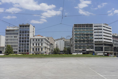 Buildings in city against sky
