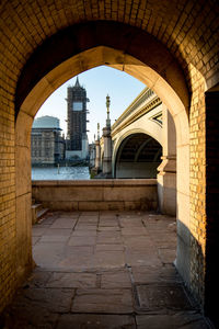 View of buildings seen through colonnade