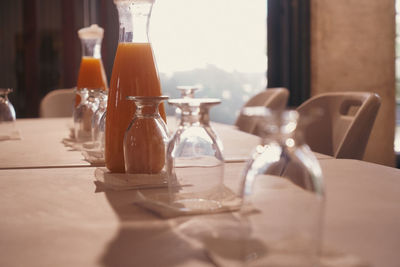 Close-up of wineglasses on table