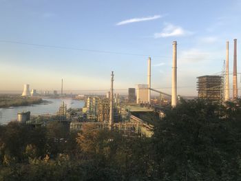 View of factory against sky