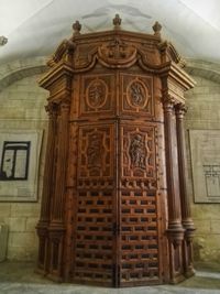 Low angle view of ornate door in building