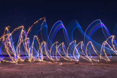 Light painting on field at night