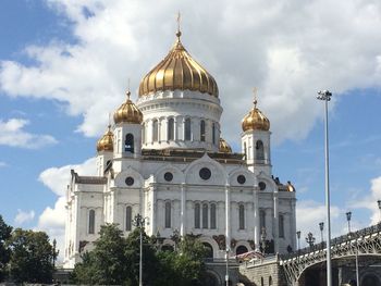 Cathedral of building against cloudy sky