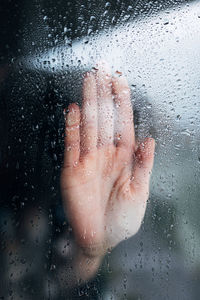 Close-up of raindrops on glass window