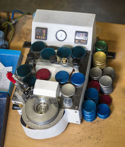 High angle view of various buttons on table