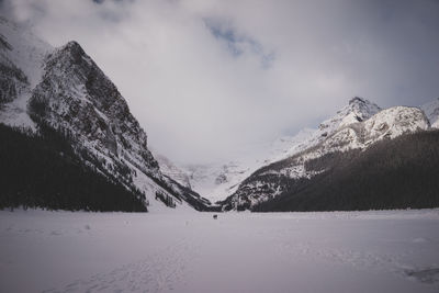 Scenic view of mountains against sky during winter