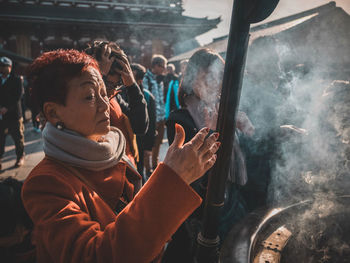 Portrait of a young man smoking