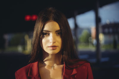 Portrait of a woman standing on the street