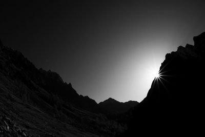 Low angle view of silhouette mountain against sky during sunset