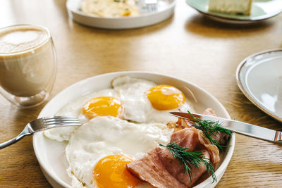 High angle view of breakfast served on table