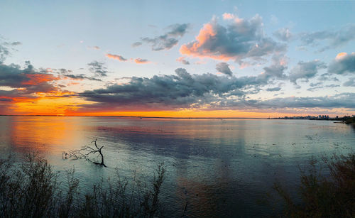 Scenic view of sea against sky during sunset