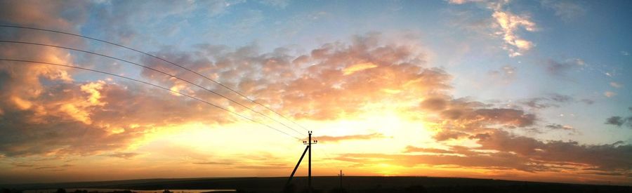 Scenic view of dramatic sky during sunset