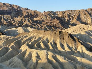 Scenic view of dramatic landscape against clear sky