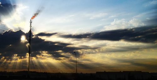 Scenic view of cloudy sky at sunset