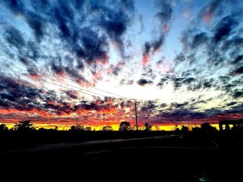 Scenic view of dramatic sky during sunset