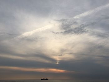 Scenic view of sea against sky at sunset