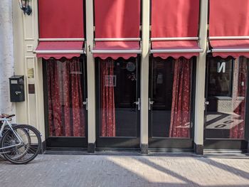 Bicycle parked in front of building