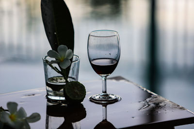 Close-up of wine in glass on table