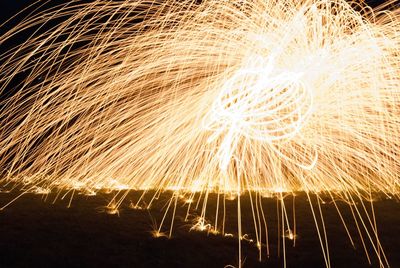 Firework display at night