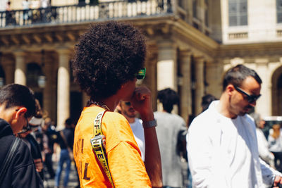 People standing on street in city