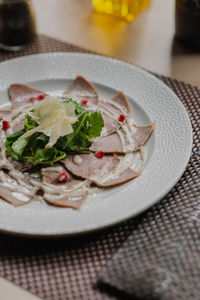 Close-up of food in plate on table