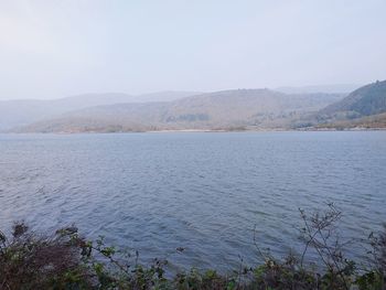 Scenic view of lake against clear sky