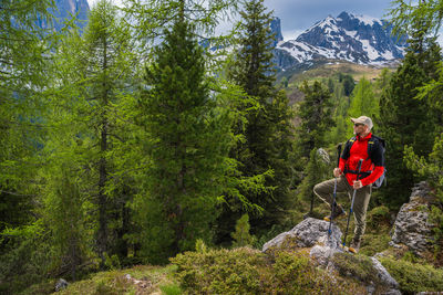 Rear view of man standing on mountain