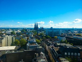 Cityscape against blue sky