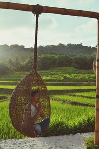 Man sitting on field