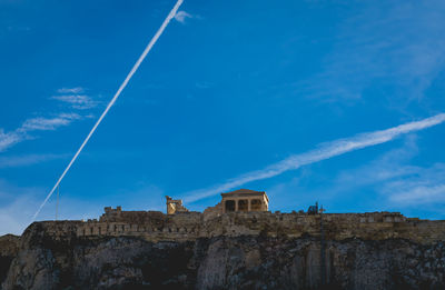 Low angle view of castle against blue sky