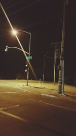 Illuminated street light at night