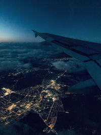 Aerial view of cityscape against sky