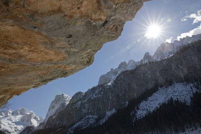 Low angle view of snow covered mountain